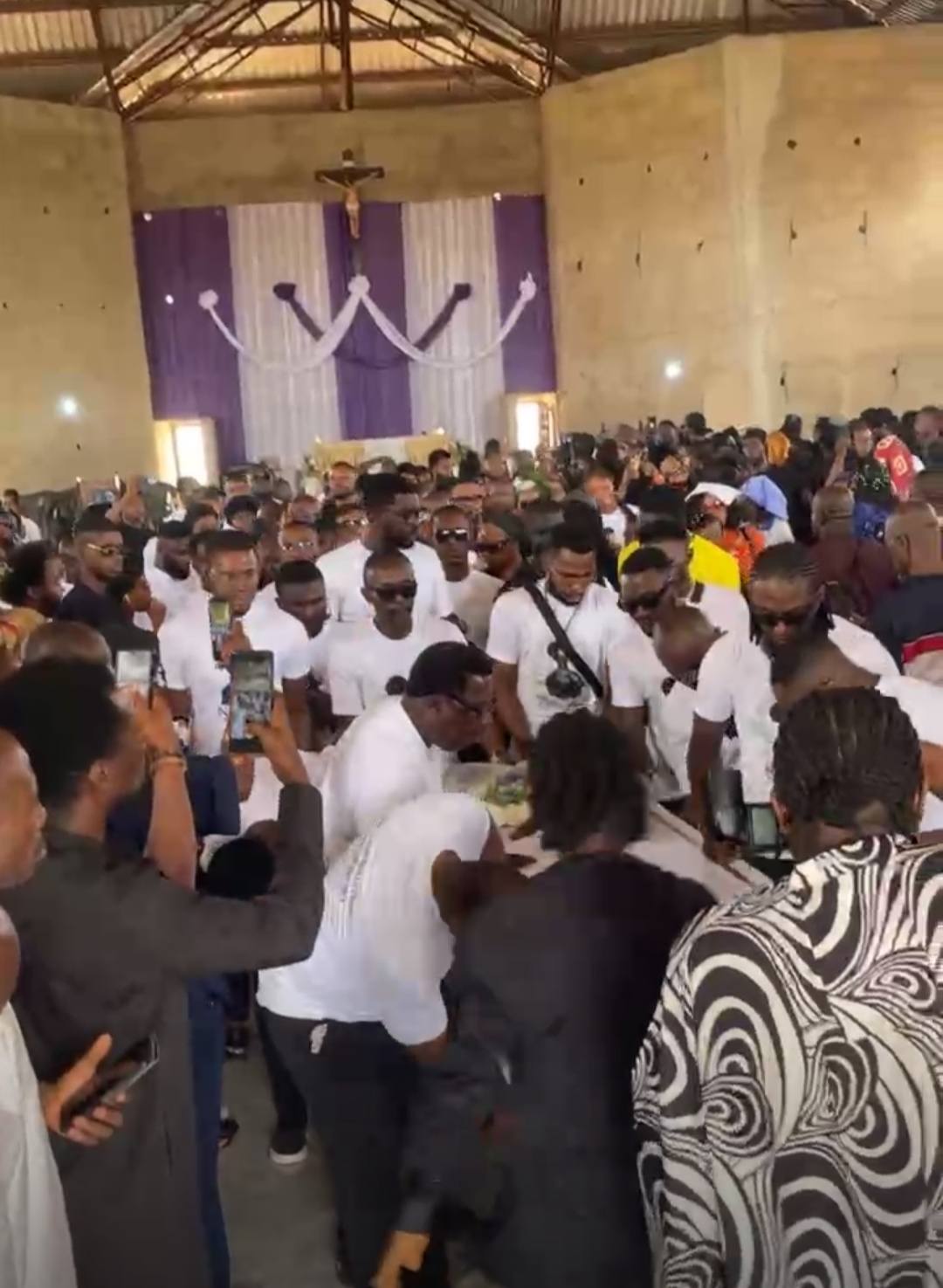 Singer bitten to de@th by snake in Abuja laid to rest (photos/video)