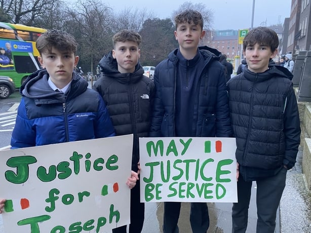 Crowd gathered outside Department of Justice