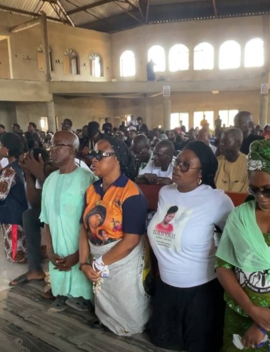 Singer bitten to de@th by snake in Abuja laid to rest (photos/video)
