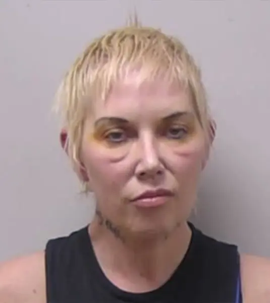 Eminem?s ex-wife looks a shadow of herself in mug shot after DUI crash that hit parked car