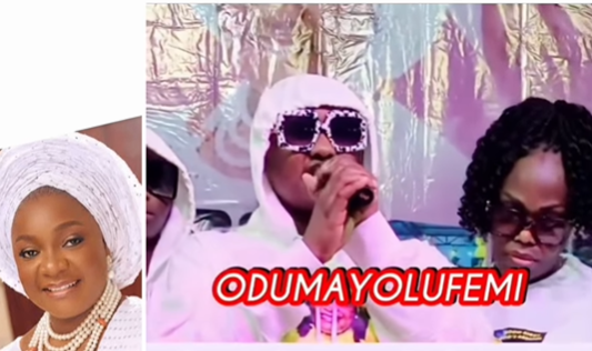 Omije Ojumi and her family during a service of songs event