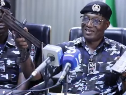 Lagos Police Commissioner Jimoh Moshood demonstrates the car jack used by vandals