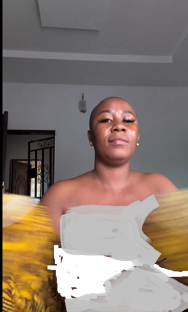 Popular Nigerian hermaphrodite Gbola Girl flashes her b0.0bs on the internet (video)