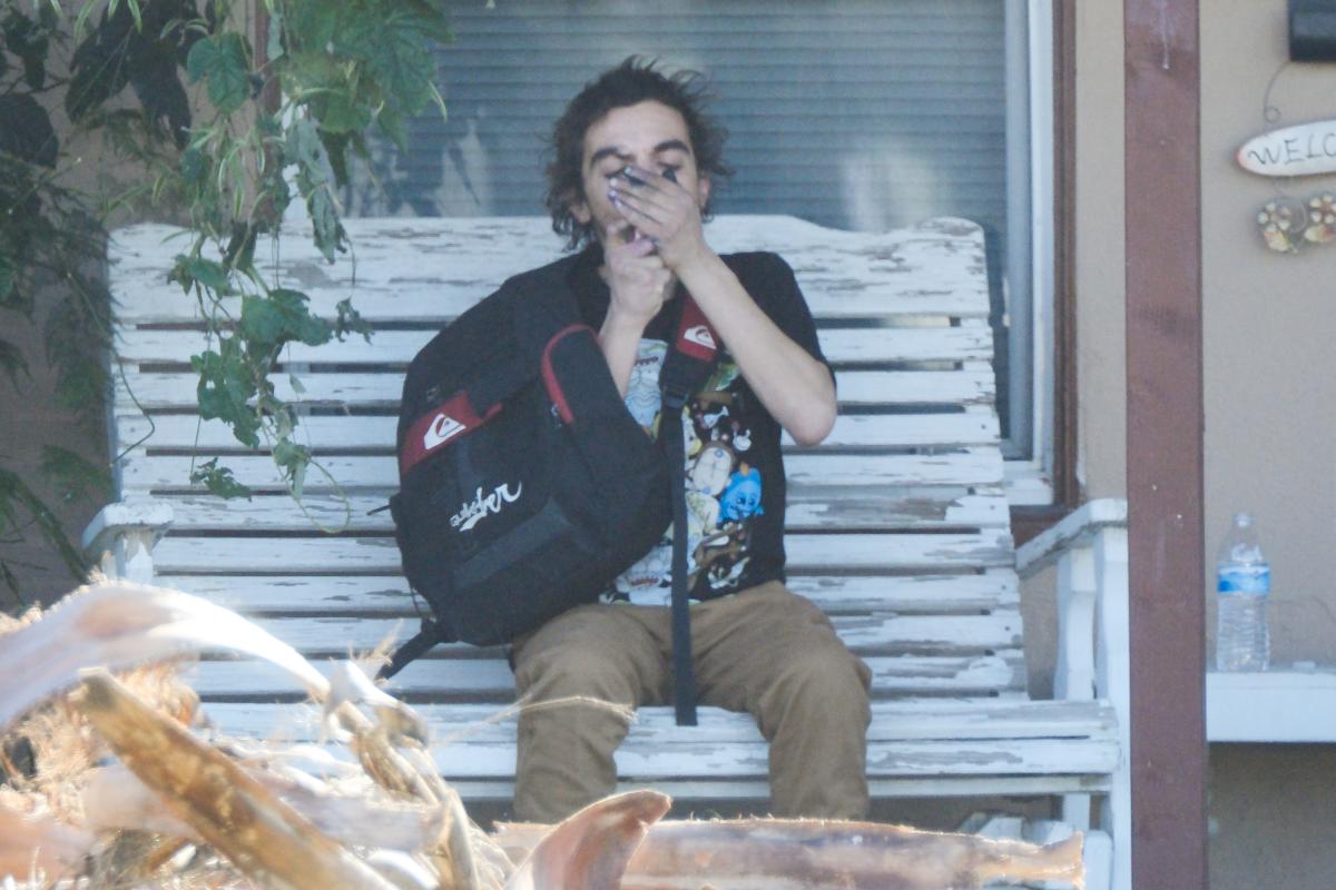 Former Nickelodeon child star Tylor Chase seen smoking and sleeping behind plank of wood weeks after being rescued from streets by former co-stars