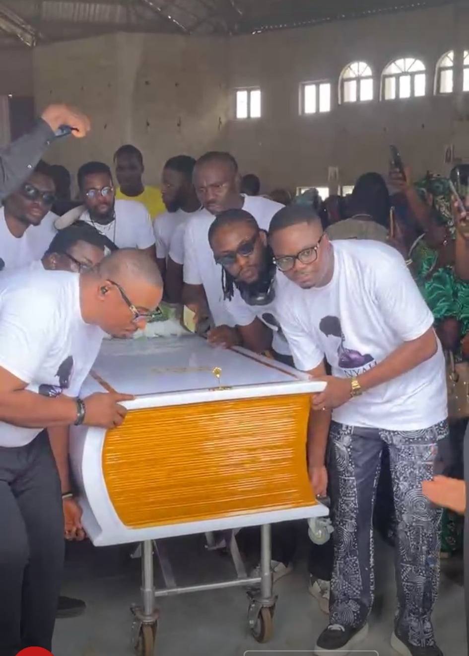 Singer bitten to de@th by snake in Abuja laid to rest (photos/video)