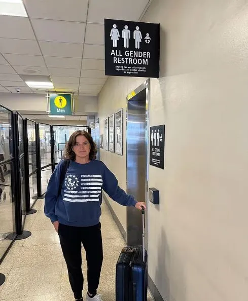 Activist reveals bikini during protest at school board meeting