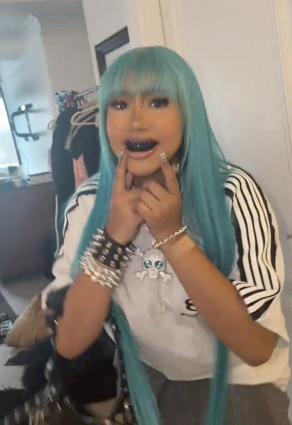 Kanye West?s daughter North West shows off new bridge piercing, blackened teeth and diamond pendant in TikTok videos