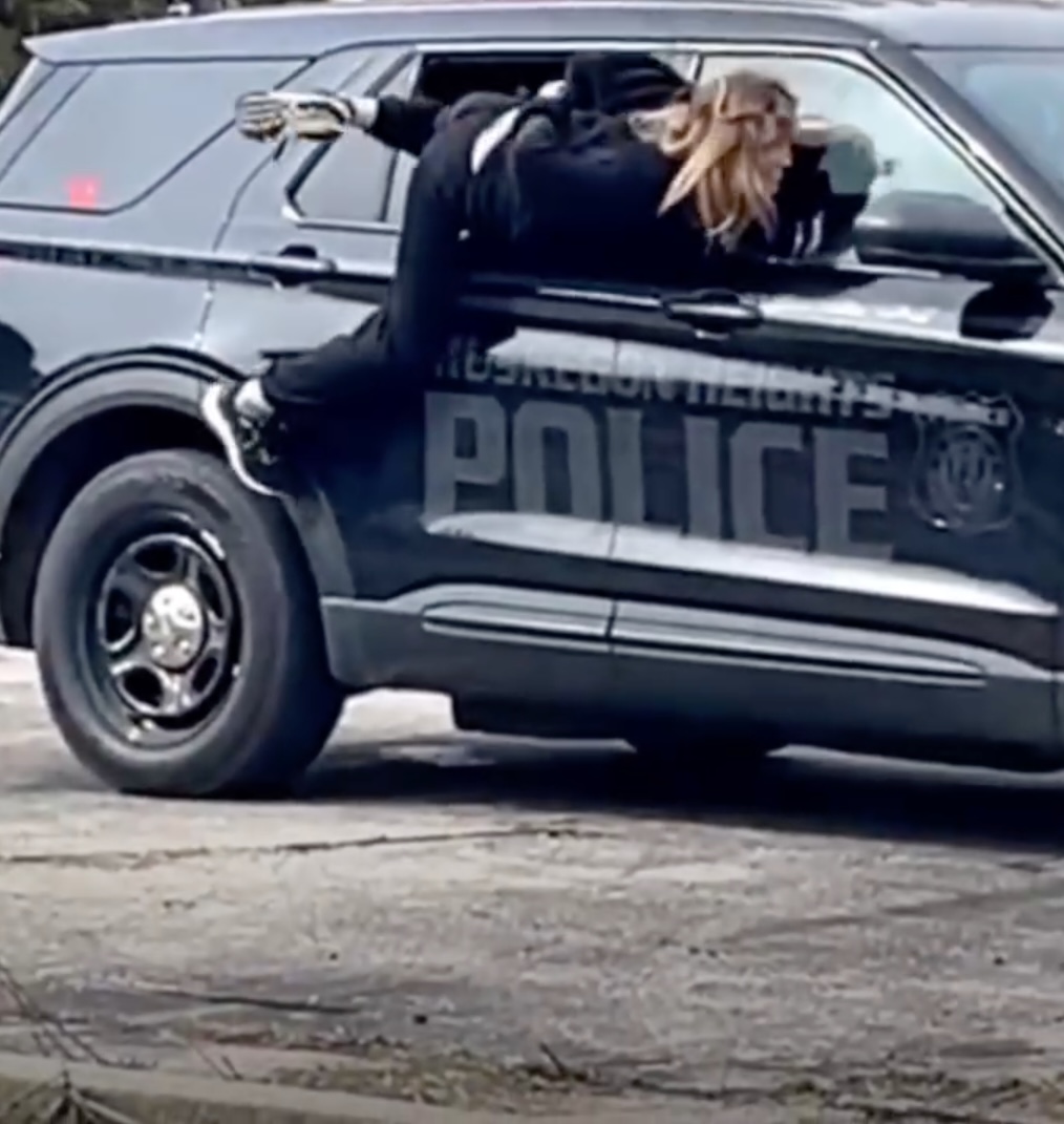 wild-video-captures-handcuffed-woman-124