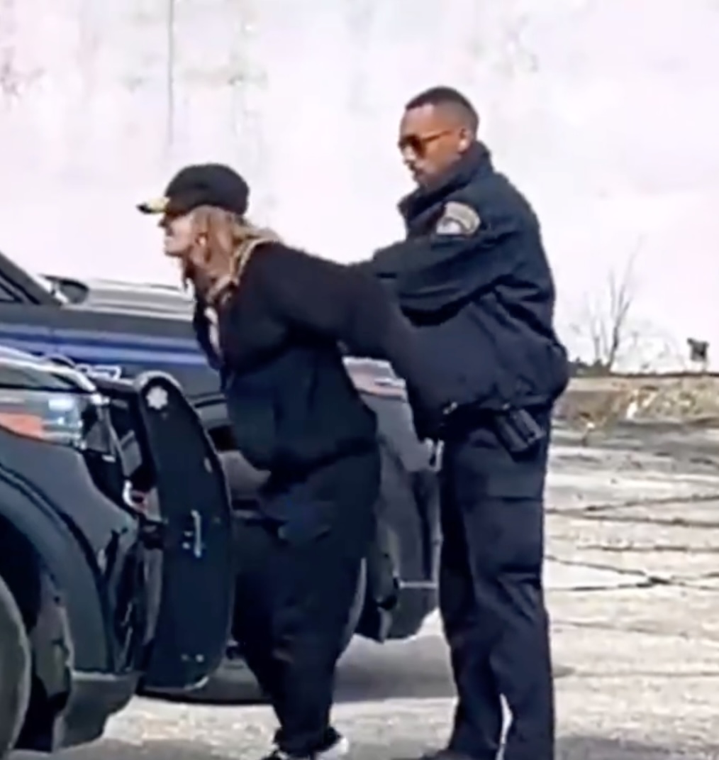 wild-video-captures-handcuffed-woman-124